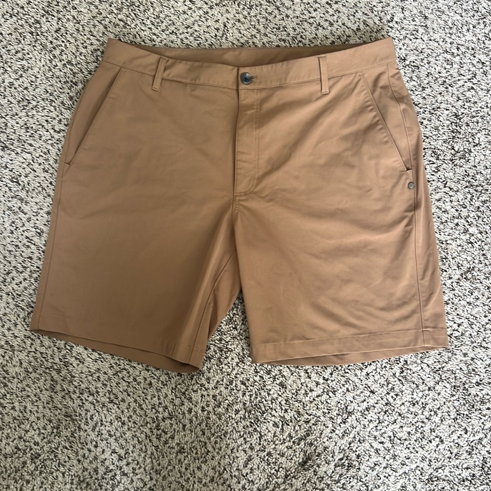 EUC Vuori Men's Meta Shorts. Size 38. Color is Camel